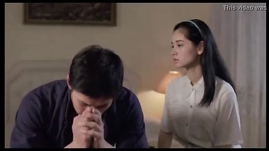 Brother with sister on bed